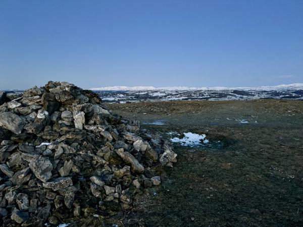 Snow covered Lake District fells such as Crinkle Crags and Great Gable, from Cunswick Fell cairn